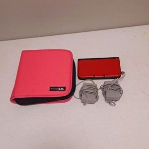 2 3DS XLs, 2 3DS cords, 1 3DS case, 22 games